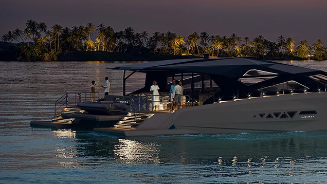 LANIAKEA luxury power catamaran at high speed on the water